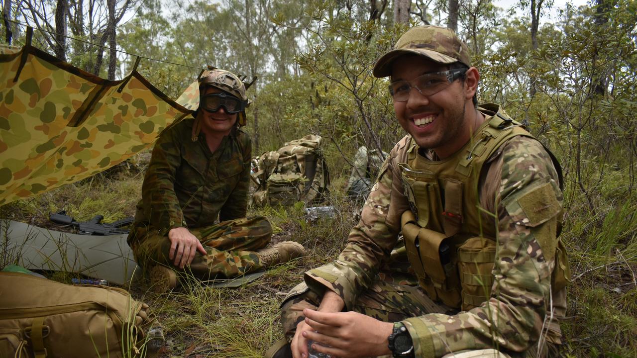 OPERATION TEMPEST: (L) Jesse Blackley and Tyrell Ebsworth rest at their camp during Operation Tempest on the Fraser Coast. Photo: Stuart Fast