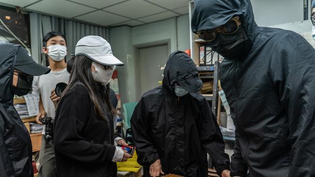 Relatives of the activists jailed in mainland China hold a press conference in Hong Kong. Picture: Getty Images