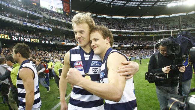 Nathan Ablett with his brother Gary after his final game for Geelong.