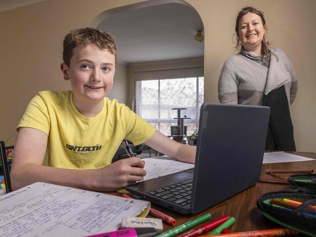 Jakob Woolf, 12, with mother Kara Goldsmith. Picture: Wayne Taylor