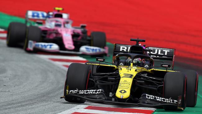 Australia’s Daniel Ricciardo of Australia leads Lance Stroll of Canada.