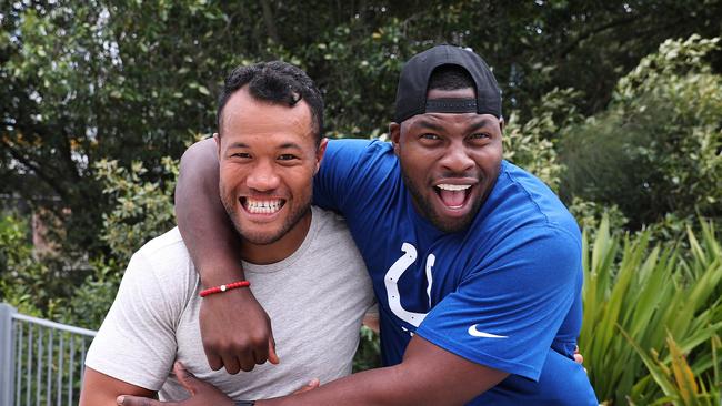 Sharks player Joseph Paulo with NFL tight end player Dwayne Allen. Picture: Brett Costello