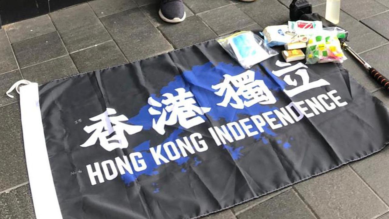 Under the new law, a man was arrested in Hong Kong simply for having a banner that advocated for independence. Picture: Hong Kong Police Force/AFP