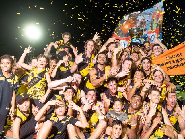 Nightcliff Tigers celebrate a third-straight premiership flag after beating St Mary's in the 2020-21 NTFL Grand Final on Saturday night. It was a game which many are now rating the greatest competition decider in NTFL history. Picture: Che Chorley