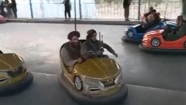 Taliban insurgents at a theme park in the city. Picture: Twitter