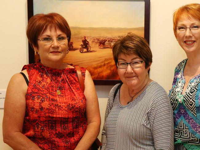 <p>Lorraine Cross, Margaret Clarke and Mary-Anne Negro and members of the Cairns Art Society celebrated their 69th Annual Art Exhibition at the official opening of the exhibition at the Cairns Regional Gallery. PICTURE: JUSTIN BRIERTY</p>