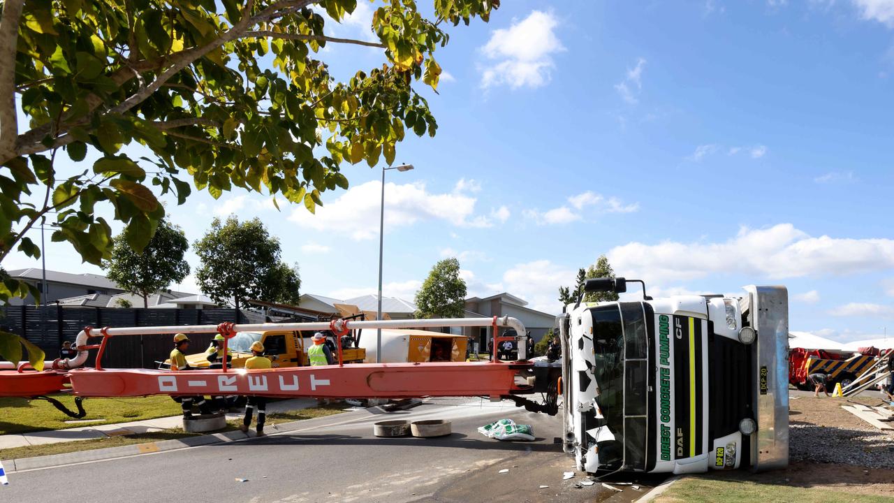 A concrete pumping truck toppled onto a house opposite where it was doing a concrete pour, Deebing Heights, Ipswich, on Friday 23rd June 2023 - Photo Steve Pohlner