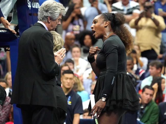 Serena Williams with referee Brian Earley. Picture: AFP