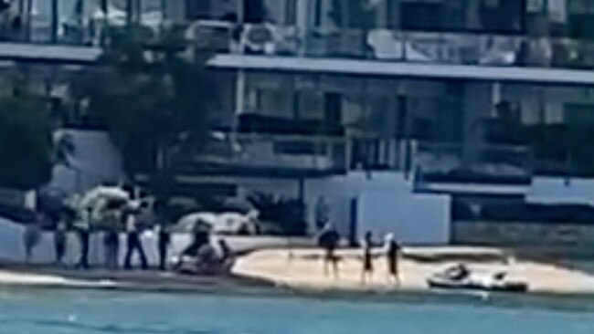 People gather at the scene where a teenage girl, 16, was mauled by a shark in Swan River, Perth, north Fremantle. Picture: Joshua Banks