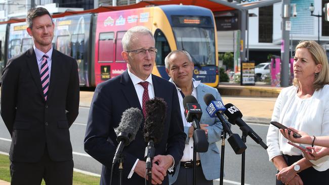 Federal Transport Minister Paul Fletcher (centre) announces funding for Gold Coast commuters. Picture Glenn Hampson