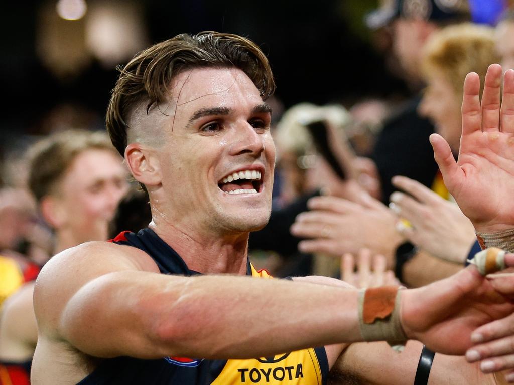 MELBOURNE, AUSTRALIA – APRIL 13: Ben Keays of the Crows celebrates with fans during the 2024 AFL Round 05 match between the Carlton Blues and the Adelaide Crows at Marvel Stadium on April 13, 2024 in Melbourne, Australia. (Photo by Dylan Burns/AFL Photos via Getty Images)