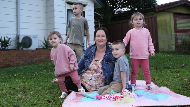 Cara Delarue at home in Blackett in Sydney’s western suburbs with her four children, Ivory, 1, Elijah, 6, Cohen, 4 and Madelyn, 3. Picture: Britta Campion