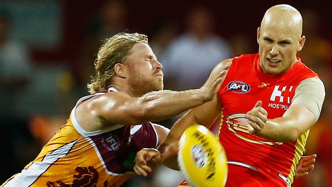 Rich pushes Gary Ablett off the ball in 2017. Picture: Getty Images