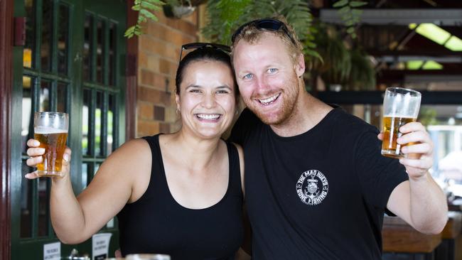 Engaged couple from Wynnum Jasmine Byron and Drew Hodges enjoy a beer at the Manly Hotel. Picture: AAP/Renae Droop