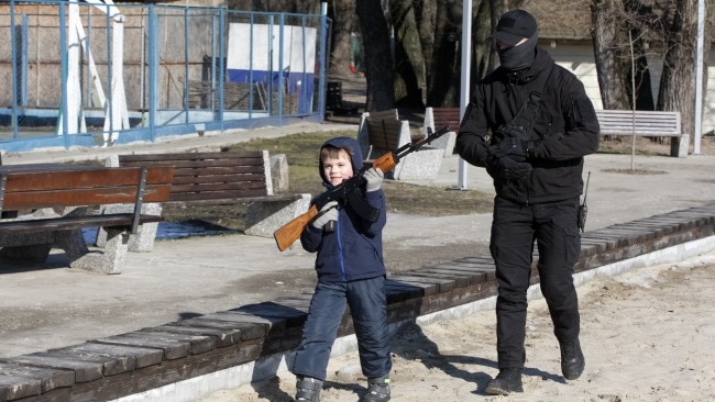 With the impending invasion, children as young as five are being taught to use weapons to protect themselves. Picture: Pavlo Gonchar/SOPA Images/LightRocket via Getty Images