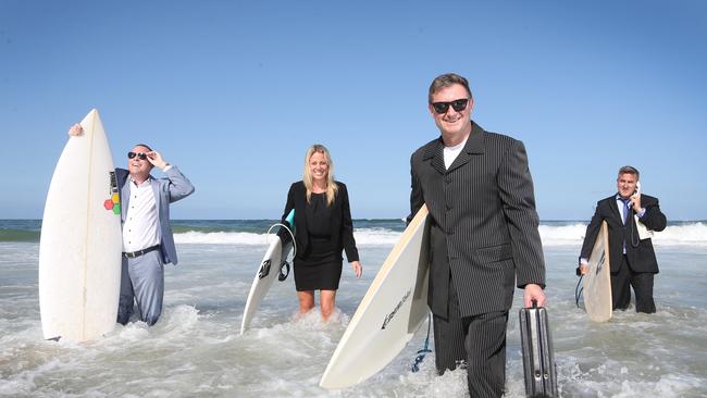 Wyndham Vacation Resorts Asia Pacific are holding a corporate surf fundraiser at the end of the month. Getting ready are Lifestylepanel CEO Ben Westaway, Wyndhams Natalie McCarthy and CEO Barry Robinson, and Bespoke Interior Solutions Managing Director Jeff Pilkington. Picture Glenn Hampson