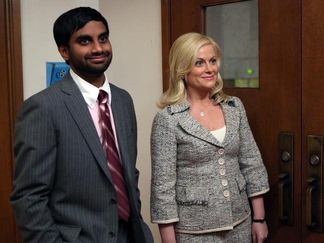 What happens in local councils ... Actor Aziz Ansari as Tom Haverford and Amy Poehler (Leslie Knope) in Parks and Recreation. Picture: NBC