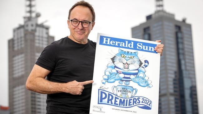 Mark Knight with the Geelong premiership poster. Picture: Mark Stewart