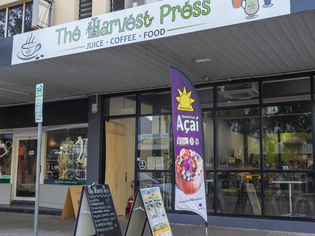 The Harvest Press has a temporary plywood door (pictured) on their shopfront while they may have to wait up to three months for its replacement. Picture: Floss Adams.