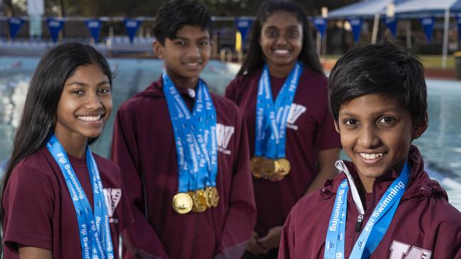 The Prasad siblings caught their eye with their dominance at the Fijian championships: From left: Michelle 12, Brendan 13, Renae, 14 and Jaydan 12, winning 16 gold, seven silver and nine bronze medals. Picture: Matthew Vasilescu