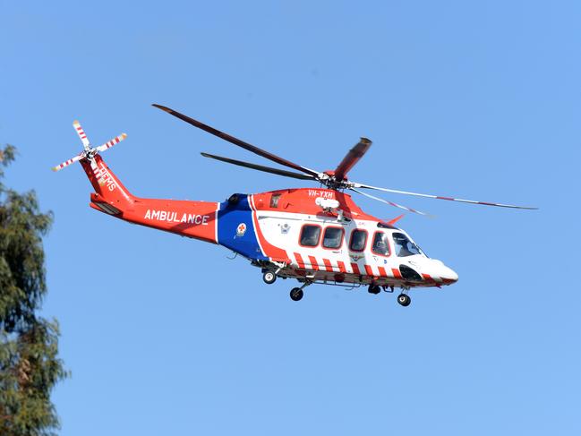 MELBOURNE, AUSTRALIA - NewsWire Photos SEPTEMBER 15, 2020: An Air Ambulance transports a man shot by police after an incident on Hutchinson St Lilydale. It is believed the man lunging at officers with a knife. Picture: NCA NewsWire / Andrew Henshaw