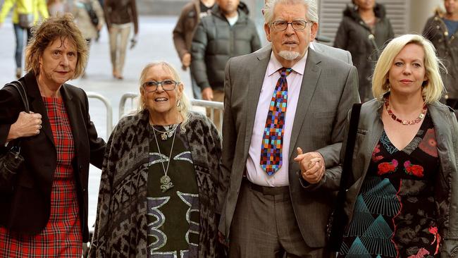 Veteran entertainer Rolf Harris with his wife Alwen (C), daughter Bindi (R) and niece Jenny (left), on the first day of his London trial for sex offences. Picture: John Stillwell