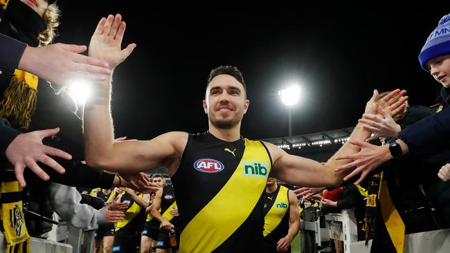 MELBOURNE, AUSTRALIA - JULY 31: Shane Edwards of the Tigers leads the team off the ground after his 300th game during the 2022 AFL Round 20 match between the Richmond Tigers and the Brisbane Lions at the Melbourne Cricket Ground on July 31, 2022 in Melbourne, Australia. (Photo by Dylan Burns/AFL Photos via Getty Images)