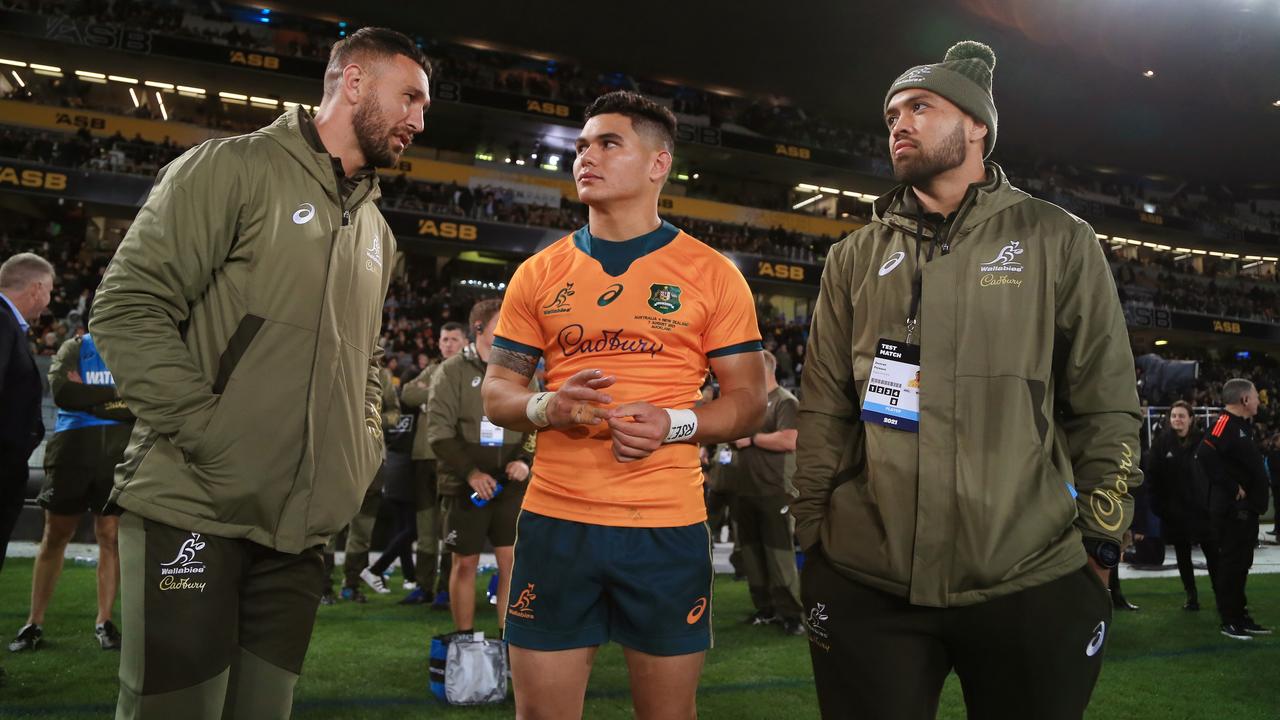 Noah Lolesio of the Wallabies with teammates Quade Cooper and Duncan Paia'Aua. Picture: Anthony Au-Yeung