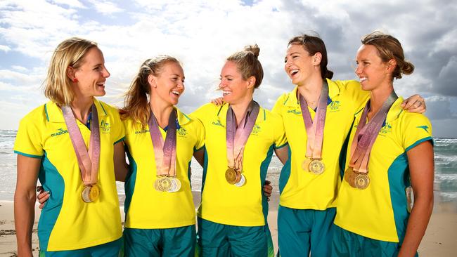 The individual girls gold medal winners Bronte Campbell, Ariarne Titmus, Emily Seebohm, Cate Campbell and Emma McKeon and  Australian Dolphins swim team gather for the media after their most successful Commonwealth Games. Pics Adam Head