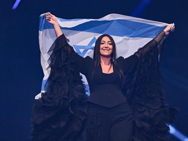 Yuval Raphael, representing Israel with the song New Day Will Rise, parades with her national flag during the dress rehearsal for the final of the Eurovision Song Contest 2025. Picture: Fabrice Coffrini / AFP
