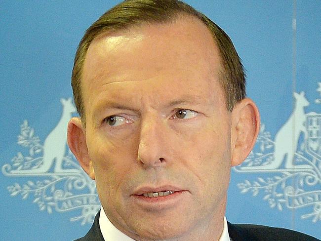 Prime Minister Tony Abbott announces a bill to axe the carbon tax during his visit at Oxford Cold storage Laverton North, Victoria. Picture: Nicole Garmston