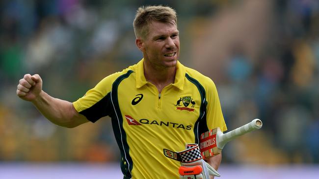 Australian batsman David Warner reacts while returning to the pavilion after being dismissed for 124 runs during the fourth one day international (ODI) match in the ongoing India-Australia cricket series at the M. Chinnaswamy Stadium in Bangalore on September 28, 2017.  / AFP PHOTO / Manjunath KIRAN / ----IMAGE RESTRICTED TO EDITORIAL USE - STRICTLY NO COMMERCIAL USE----- / GETTYOUT