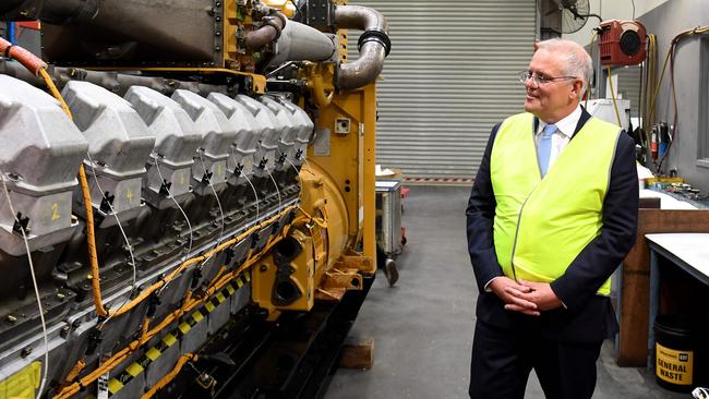 Australia's Prime Minister Scott Morrison tours the William Adams CAT facility in Melbourne. Picture: William WEST / AFP