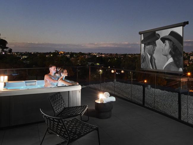 Watching movies from your balcony hot tub.