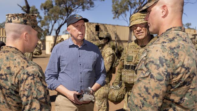 Defence Minister Peter Dutton with Australian and US troops during joint exercises near Townsville. Picture: Defence Department