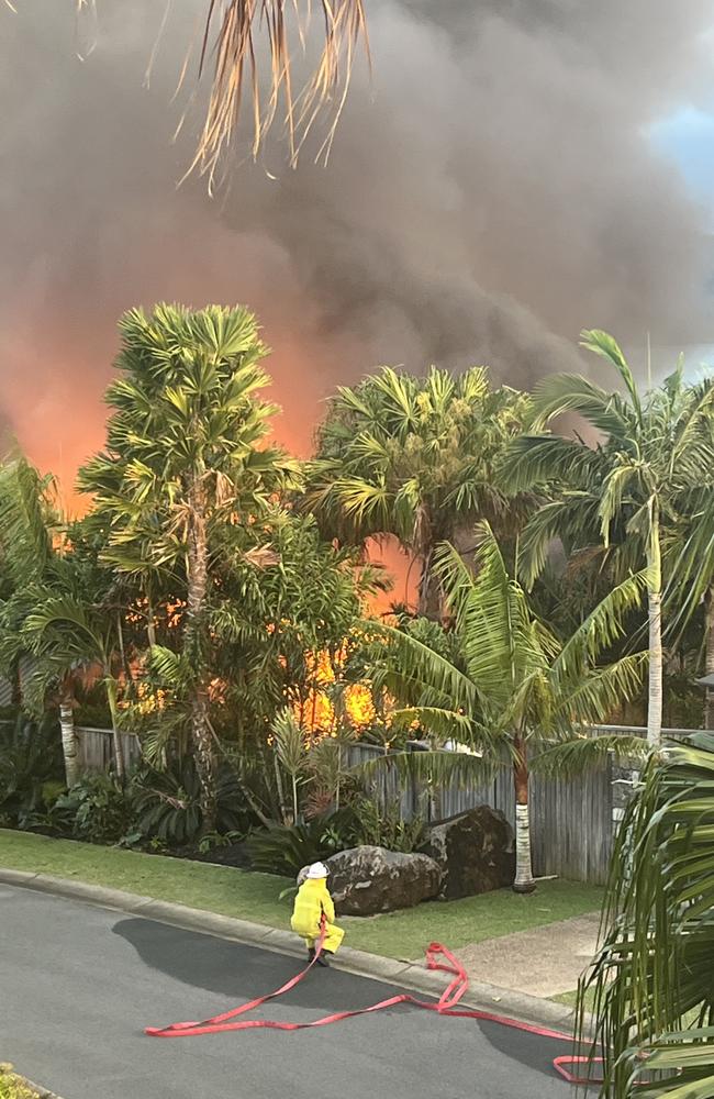 Fire crews battle the blaze that gutted the $4m plus home on Hamilton Island's exclusive Coral Sea Ave. Photo: Rory Wynbergen