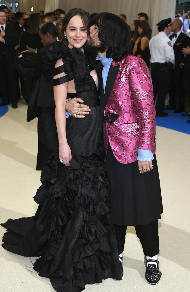 Dakota Johnson and Alessandro Michele attend the “Rei Kawakubo/Comme des Garcons: Art Of The In-Between” Costume Institute Gala at Metropolitan Museum of Art on May 1, 2017 in New York City. Picture: Getty