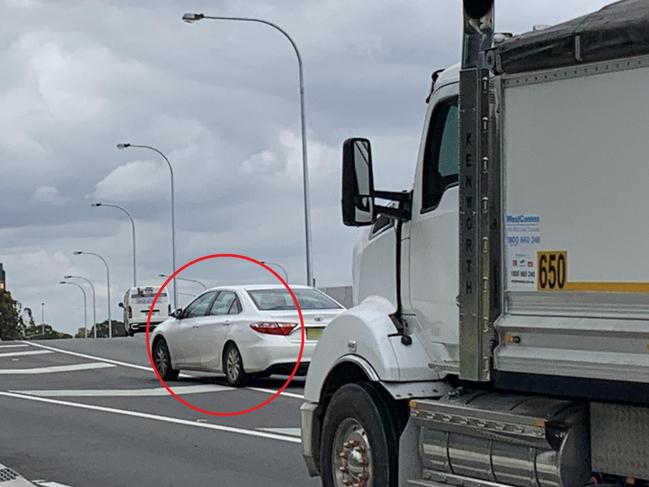 Vehicles dangerously swerving through chevrons on Wattle St, Haberfield, close to the M4 WestConnex. Pic: Benedict Brook