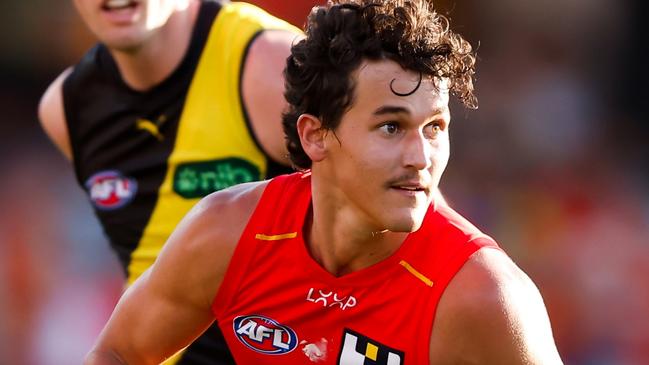 GOLD COAST, AUSTRALIA - MARCH 09: Wil Powell of the Suns in action during the 2024 AFL Opening Round match between the Gold Coast SUNS and the Richmond Tigers at People First Stadium on March 09, 2024 in Gold Coast, Australia. (Photo by Dylan Burns/AFL Photos via Getty Images)