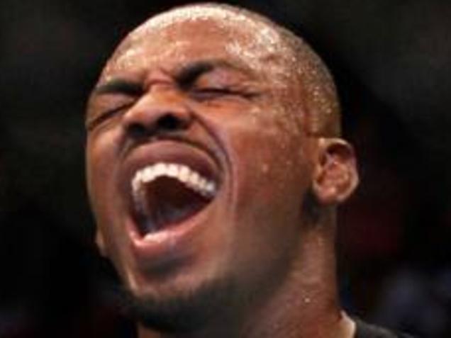 ATLANTA, GA - APRIL 21: Jon Jones celebrates defeating Rashad Evans by unanimous decision in their light heavyweight title bout for UFC 145 at Philips Arena on April 21, 2012 in Atlanta, Georgia. (Photo by Kevin C. Cox/Getty Images)