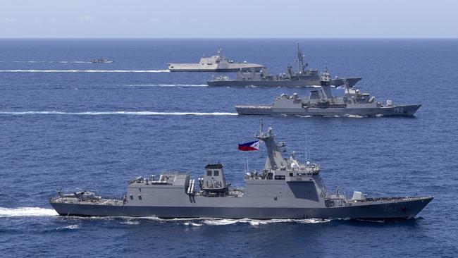 USS Mobile, JS Akebono, HMAS Warramunga, BRP Antonio Luna and BRP Valentine Diaz during a four-nation maritime exercise including Australia, the US, Japan and the Philippines.