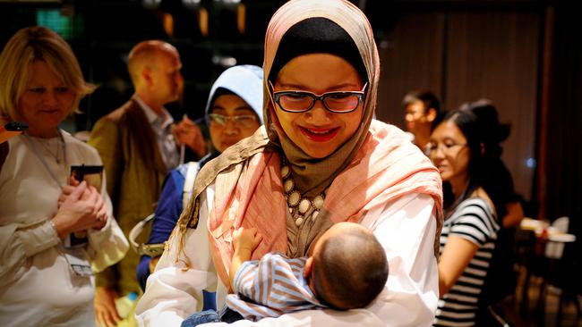 Hope for the future ... little Muhammad in his mother’s arms.