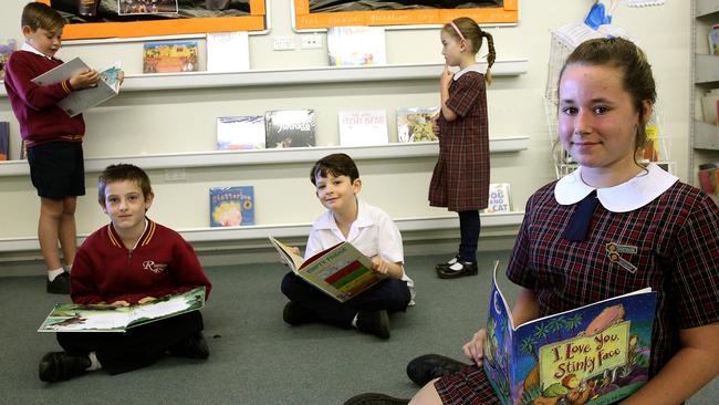 Riverstone Public School students Jake Sawtell, Callum Zarka, Max Clarke, Evie Zarka and Hayley Sawtell love reading. Pictures: Carmela Roche