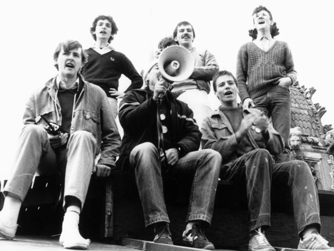 A young Anthony Albanese (L), leads students in a protest atop the University of Sydney clock tower in an undated photo. Picture: Supplied