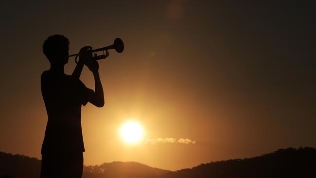 Lindisfarne year 10 student Monty Lush plays the Last Post as the sun sets over the Tweed Coast. Picture: Scott Powick/Tweed Daily News/File