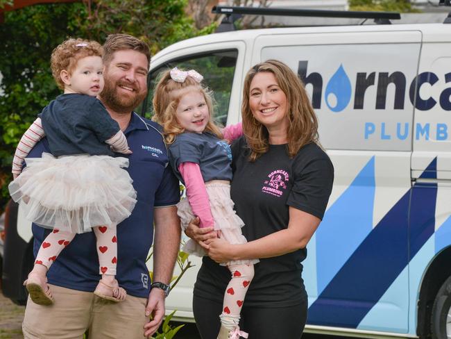 ADELAIDE, AUSTRALIA - AUGUST 11, 2023: Best Plumber Cal Horncastle of Horncastle Plumbing with his wife Ilse and daughters Nina 3 and Nellie 18 months. Picture: Brenton Edwards