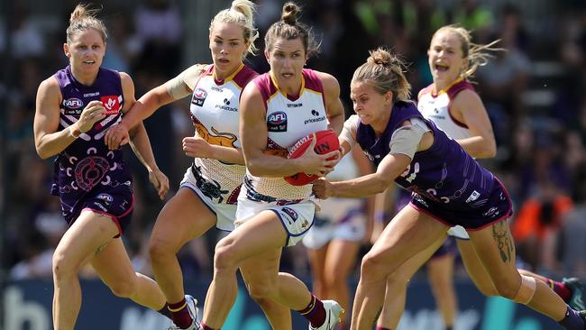 Catherine Svarc storms through a tackle.