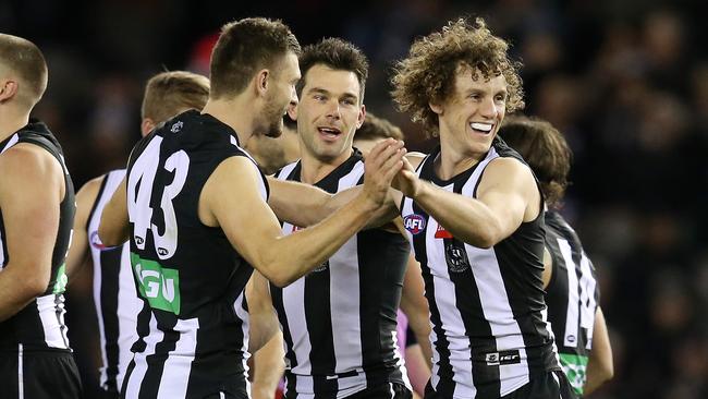 Chris Mayne is mobbed by teammates after kicking a goal last week. Picture: Michael Klein