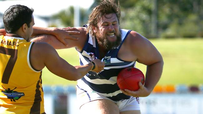 Crocs big man Kallam Oates brushes off Hawks' Duncan Seden in the AFL Cairns match between the Manunda Hawks and the Port Douglas Crocs, held at Cazalys Stadium, Westcourt. PICTURE: BRENDAN RADKE