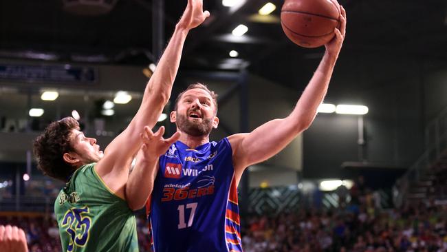 12/12/15 - Adelaide 36ers v Townsville Crocs at Adelaide Arena. Crocs' Clint Steindl defends 36ersÕ Anthony Petrie. Photo Tom Huntley